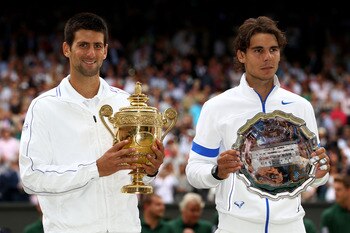 LONDON, ENGLAND - JULY 03:  Winner Novak Djokovic of Serbia (L) and runner-up Rafael Nadal of Spain with their trophies after their final round Gentlemen's match on Day Thirteen of the Wimbledon Lawn Tennis Championships at the All England Lawn Tennis and