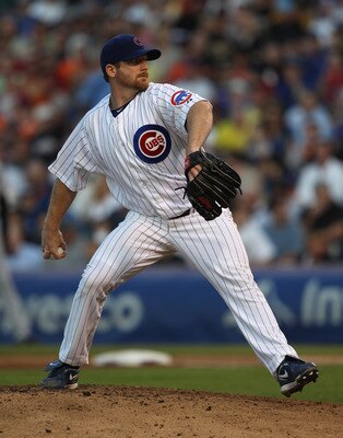 CHICAGO, IL - JUNE 29: Starting pitcher Ryan Dempster #49 of the Chicago Cubs delivers the ball against the San Francisco Giants at Wrigley Field on June 29, 2011 in Chicago, Illinois. The ubs defeated the Giants 2-1. (Photo by Jonathan Daniel/Getty Image