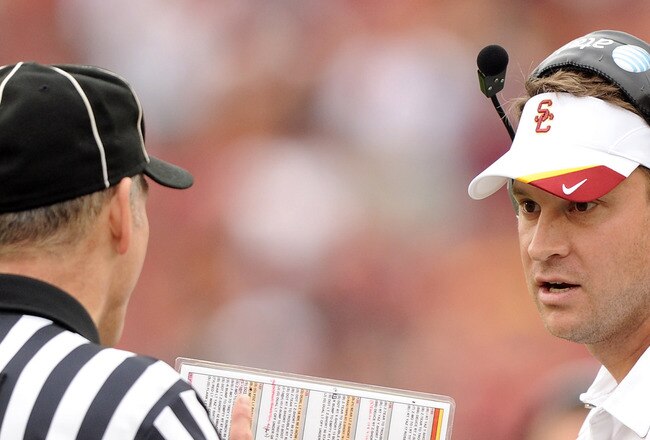 LOS ANGELES, CA - OCTOBER 16:  Head Coach Lane Kiffin of the USC Trojans argues a call with an official against the California Golden Bears at Los Angeles Memorial Coliseum on October 16, 2010 in Los Angeles, California.  (Photo by Harry How/Getty Images)