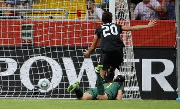DRESDEN, GERMANY - JULY 10:  Abby Wambach of USA scores their second goal during the Women's World Cup Quarter Final match between Brazil and USA at Rudolf-Harbig Stadium on July 10, 2011 in Dresden, Germany.  (Photo by Scott Heavey/Getty Images)