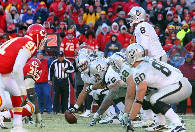KANSAS CITY, MO - JANUARY 02:  The Oakland Raiders offense lines up against the defense of the Kansas City Chiefs at Arrowhead Stadium on January 2, 2011 in Kansas City, Missouri.  (Photo by Tim Umphrey/Getty Images)