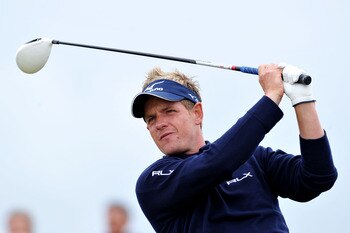 SANDWICH, ENGLAND - JULY 13:  Luke Donald of England watches a tee shot during the final practice round during The Open Championship at Royal St. George's on July 13, 2011 in Sandwich, England. The 140th Open begins on July 14, 2011..  (Photo by Stuart Fr