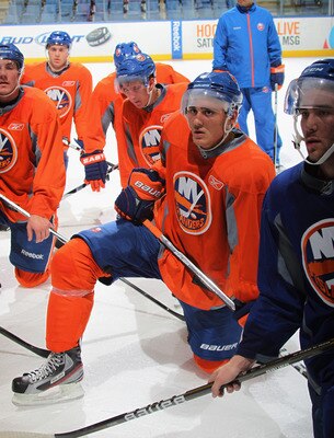 UNIONDALE, NY - JULY 13:  Nino Niederreiter #25 of the New York Islanders listens to the coaches instructions at the prospects evaluation camp at Nassau Veterans Memorial Coliseum on July 13, 2011 in Uniondale, New York.  (Photo by Bruce Bennett/Getty Ima