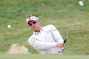 SANDWICH, ENGLAND - JULY 13:  Ian Poulter of England hits from a bunker during the final practice round during The Open Championship at Royal St. George's on July 13, 2011 in Sandwich, England. The 140th Open begins on July 14, 2011..  (Photo by Stuart Fr
