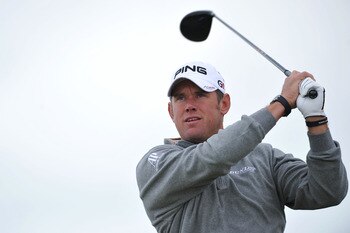 SANDWICH, ENGLAND - JULY 13:  Lee Westwood of England watches a shot during the final practice round during The Open Championship at Royal St. George's on July 13, 2011 in Sandwich, England. The 140th Open begins on July 14, 2011..  (Photo by Stuart Frank