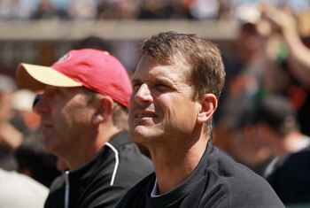 SAN FRANCISCO, CA - JUNE 08:  San Francisco 49ers head coach Jim Harbaugh watches the San Francisco Giants play the Washington Nationals at AT&T Park on June 8, 2011 in San Francisco, California.  (Photo by Ezra Shaw/Getty Images)