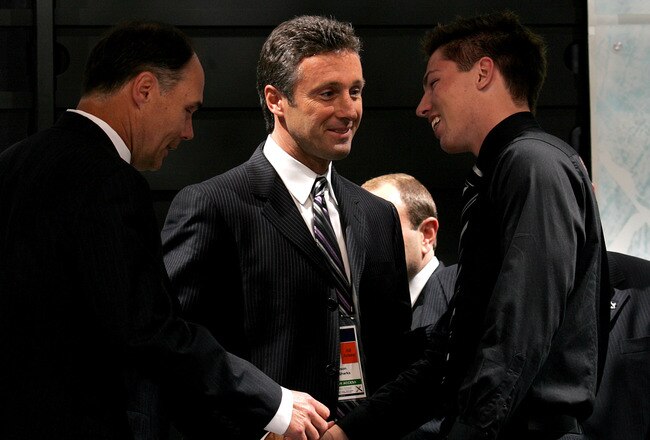 COLUMBUS, OH - JUNE 22:  General manager Doug Wilson of the San Jose Sharks looks on as ninth overall pick Logan Couture is introduced during the first round of the 2007 NHL Entry Draft at Nationwide Arena on June 22, 2007 in Columbus, Ohio.  (Photo by Br