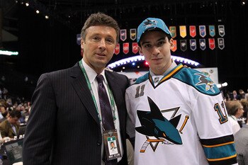 ST PAUL, MN - JUNE 25:  47th overall pick 	Matt Nieto by the San Jose Sharks and General Manager Doug Wilson of the San Jose Sharks pose for a photo on the draft floor during day two of the 2011 NHL Entry Draft at Xcel Energy Center on June 25, 2011 in St