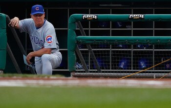 PITTSBURGH - JULY 08: Manager Mike Quade #8 of the Chicago Cubs waits for his team to take the field against the Pittsburgh Pirates on July 8, 2011 at PNC Park in Pittsburgh, Pennsylvania.  (Photo by Jared Wickerham/Getty Images)