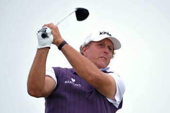 SANDWICH, ENGLAND - JULY 12:  Phil Mickelson of the USA tees off during the second practice round during The Open Championship at Royal St. George's on July 12, 2011 in Sandwich, England. The 140th Open begins on July 14, 2011.  (Photo by Stuart Franklin/