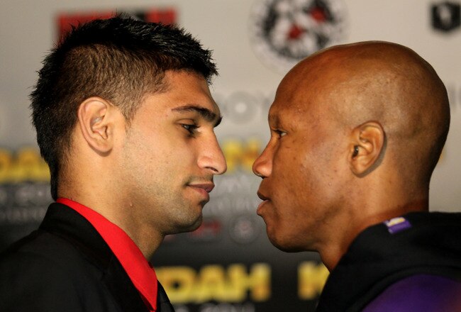 LOS ANGELES, CA - JUNE 8:   Amir Khan (L) and Zab Judah face off at a press conference to discuss their upcoming Super Lightweight World Championship Unification Fight at ESPN Zone At L.A. Live on June 8, 2011 in Los Angeles, California. (Photo by Stephen