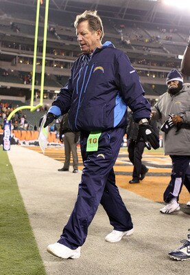 CINCINNATI - DECEMBER 26:  Norv Turner the Head Coach of the San Diego Chargers walks off of the field following the Chargers 34-20 loss to the Cincinnati Bengals during the NFL game at Paul Brown Stadium on December 26, 2010 in Cincinnati, Ohio.  (Photo