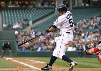 SEATTLE - JUNE 15:  Ichiro Suzuki #51 of the Seattle Mariners doubles in the fifth inning against the Los Angeles Angels of Anaheim at Safeco Field on June 15, 2011 in Seattle, Washington. (Photo by Otto Greule Jr/Getty Images)