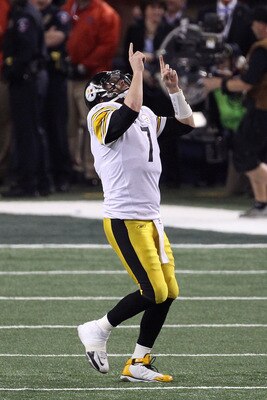 ARLINGTON, TX - FEBRUARY 06: Ben Roethlisberger #7 of the Pittsburgh Steelers celebrates after an 8 yard touchdown pass against the Green Bay Packers during Super Bowl XLV at Cowboys Stadium on February 6, 2011 in Arlington, Texas.  (Photo by Streeter Lec