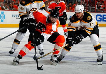 PHILADELPHIA, PA - MAY 02:  Nathan Horton #18 of the Boston Bruins covers Ville Leino #22 of the Philadelphia Flyers during Game Two of the Eastern Conference Semifinals during the 2011 NHL Stanley Cup Playoffs at Wells Fargo Center on May 2, 2011 in Phil