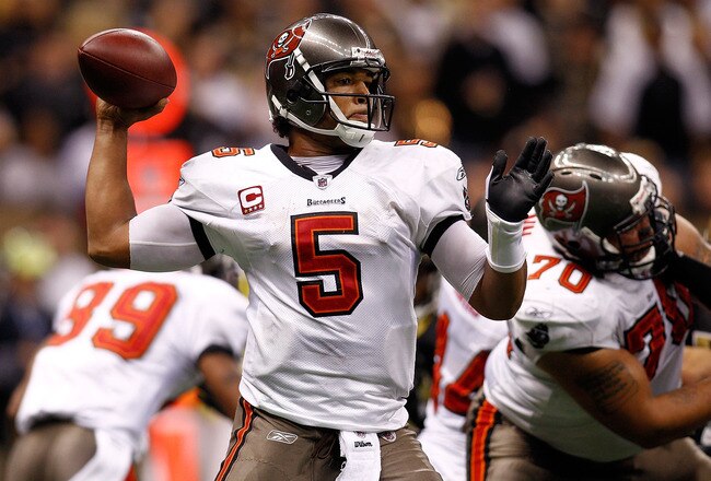 NEW ORLEANS, LA - JANUARY 02:  Quarterback Josh Freeman #5  of the Tampa Bay Buccaneers throws the ball during the game against the New Orleans Saints at the Louisiana Superdome on January 2, 2011 in New Orleans, Louisiana.  (Photo by Chris Graythen/Getty