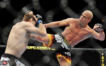 LAS VEGAS - NOVEMBER 21: Tito Ortiz (R) battles Forrest Griffin (L) during their Light Heavyweight Fight at the UFC 106 at Mandalay Bay Events Center on November 21, 2009 in Las Vegas, Nevada. (Photo by Jon Kopaloff/Getty Images)