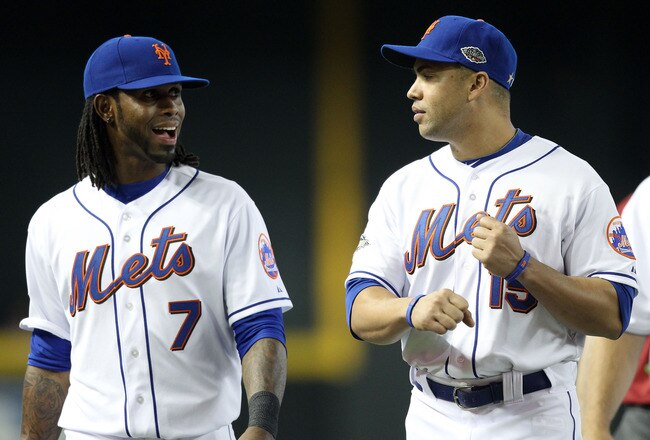 PHOENIX, AZ - JULY 12:  National League All-Star Jose Reyes #7 of the New York Mets and National League All-Star Carlos Beltran #15 of the New York Mets talk in the field during batting practice before the start of the 82nd MLB All-Star Game at Chase Fiel