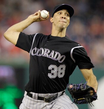 WASHINGTON, DC - JULY 09:  Starting pitcher Ubaldo Jimenez #38 of the Colorado Rockies delivers to a Washington Nationals batter at Nationals Park on July 9, 2011 in Washington, DC.  (Photo by Rob Carr/Getty Images)