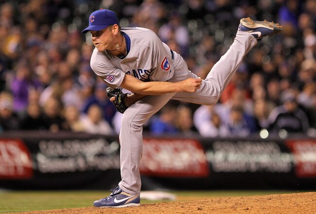 DENVER, CO - APRIL 16:  Relief pitcher Kerry Wood #34 of the Chicago Cubs works against Jason Giambi #23 of the Colorado Rockies in the eighth inning at Coors Field on April 16, 2011 in Denver, Colorado.  (Photo by Doug Pensinger/Getty Images)