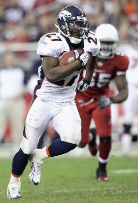 GLENDALE, AZ - DECEMBER 12:  Runningback Knowshon Moreno #27 of the Denver Broncos rushes the football past Joey Porter #55 of the Arizona Cardinals during the NFL game at the University of Phoenix Stadium on December 12, 2010 in Glendale, Arizona. The Ca