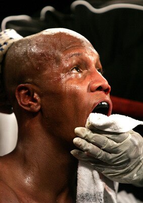 NEW YORK - JANUARY 07:  Zab Judah is worked on in the corner between rounds during his fight against Carlos Baldomir for the undisputed World Welterweight Championship fight at Madison Square Garden January 7, 2006 in New York City. Carlos Baldomir won a