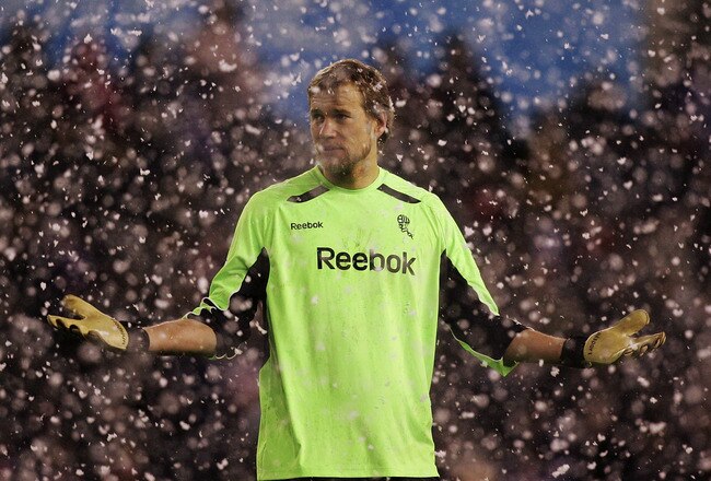 STOKE, UNITED KINGDOM - MARCH 04:  Jussi Jaaskelainen of Bolton Wanderers looks on, as the snow falls during the Barclays Premier League match between Stoke City and Bolton Wanderers at the Britannia Stadium on March 4, 2009 in Stoke, England.  (Photo by