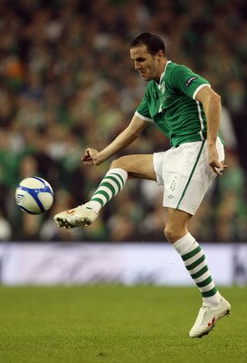 DUBLIN, IRELAND - OCTOBER 08:  John O'Shea of the Republic of Ireland in action during the EURO 2012 Qualifier Group B match between the Republic of Ireland and Russia at Lansdowne Road on October 8, 2010 in Dublin, Ireland.  (Photo by Bryn Lennon/Getty I
