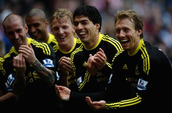 SUNDERLAND, ENGLAND - MARCH 20: Luis Suarez of Liverpool (2ndr) celebrates his goal alongside Lucas Leiva, Dirk Kuyt and Raul Meireles during the Barclays Premier League match between Sunderland and Liverpool at the Stadium of Light on March 20, 2011 in S