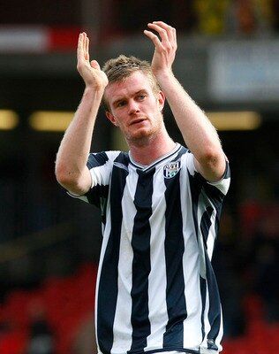 WATFORD, ENGLAND - APRIL 05: Goalscorer Chris Brunt of West Bromwich Albion celebrates after the Coca Cola Championship match between Watford and West Bromwich Albion at Vicarage Road on April 05, 2010 in Watford, England. (Photo by Tom Dulat/Getty Images