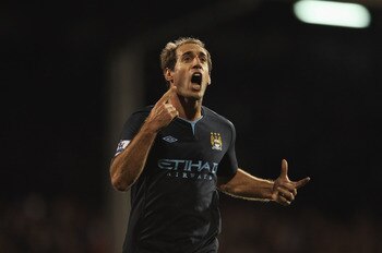 LONDON, ENGLAND - NOVEMBER 21:  Pablo Zabaleta of Manchester City celebrates scoring his teams second goal during the Barclays Premier League match between Fulham and Manchester City at Craven Cottage on November 21, 2010 in London, England.  (Photo by Sc
