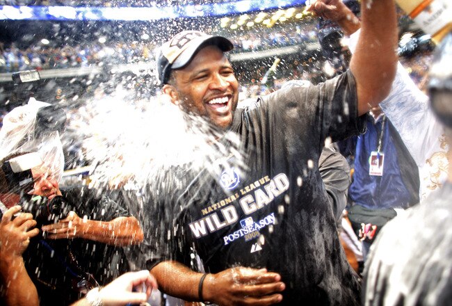 MILWAUKEE - SEPTEMBER 28:  CC Sabathia of the Milwaukee Brewers is sprayed by champaign as he and the Brewers celebrate clinching the National League Wild Card after the game against the Chicago Cubs at Miller Park on September 28, 2008 in Milwaukee, Wisc