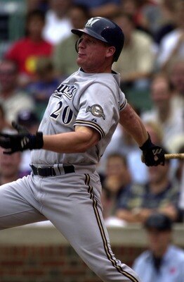 23 Aug 2001:  Outfielder Jeromy Burnitz #20 of the Milwaukee Brewers gets a hit in the first inning driving in two runs against the Chicago Cubs at Wrigley Field in Chicago, Illinois. The Brewers won 8-1. DIGITAL IMAGE Mandatory Credit: Jonathan Daniel/AL