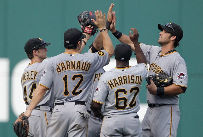 WASHINGTON, DC - JULY 03: Members of the Pittsburgh Pirates celebrate their 10-2 win over the Washington Nationals at Nationals Park on July 3, 2011 in Washington, DC.  (Photo by Rob Carr/Getty Images)