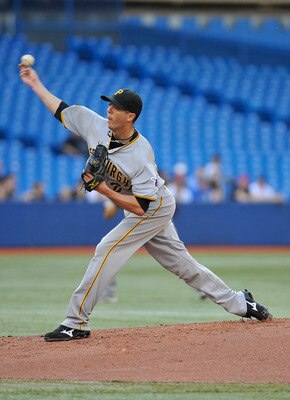 TORONTO, CANADA - JUNE 30:  Jeff Karstens #27 of the Pittsburgh Pirates delivers a pitch during MLB interleague game action against the Toronto Blue Jays June 30, 2011 at Rogers Centre in Toronto, Ontario, Canada. (Photo by Brad White/Getty Images)