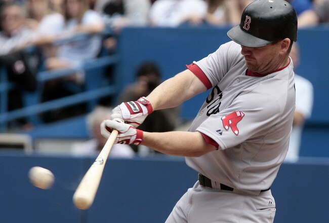 TORONTO, CANADA - JUNE 12: J.D. Drew #7 of the Boston Red Sox hits against the Toronto Blue Jays during MLB action at The Rogers Centre June 12, 2011 in Toronto, Ontario, Canada. (Photo by Abelimages/Getty Images)