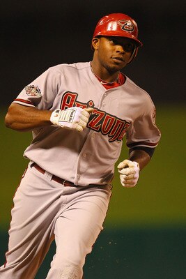 ST. LOUIS, MO - JULY 7: Justin Upton #10 of the Arizona Diamondbacks rounds the bases after hitting a two-run home run against the St. Louis Cardinals at Busch Stadium on July 7, 2011 in St. Louis, Missouri.  (Photo by Dilip Vishwanat/Getty Images)