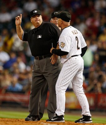 HOUSTON - JUNE 28:  Manager Brad Mills #2 of the Houston Astros is ejected from the game by third base umpire Jerry Layne in the seventh inning foir arguing a call at first base during a baseball game against the Texas Rangers at Minute Maid Park on June