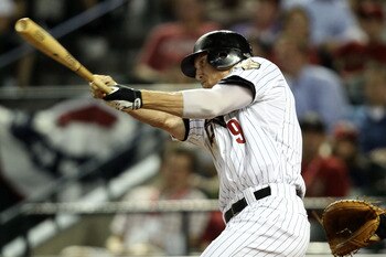 PHOENIX, AZ - JULY 12:  National League All-Star Hunter Pence #9 of the Houston Astros hits a single in the seventh inning of the 82nd MLB All-Star Game at Chase Field on July 12, 2011 in Phoenix, Arizona.  (Photo by Christian Petersen/Getty Images)