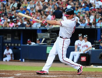 ATLANTA - JULY 6: Chipper Jones #10 of the Atlanta Braves hits a 3rd inning home run against the Colorado Rockies at Turner Field on July 6, 2011 in Atlanta, Georgia. (Photo by Scott Cunningham/Getty Images)