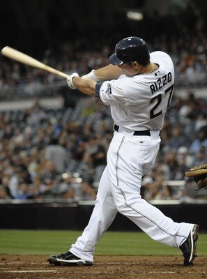 SAN DIEGO, CA - JUNE 28:  Anthony Rizzo #27 of the San Diego Padres hits a double during the fourth inning of a baseball game against the Kansas City Royals at Petco Park on June 28, 2011 in San Diego, California.  The Padres won 4-2. (Photo by Denis Poro