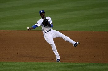 LOS ANGELES, CA - JUNE 20:  Shortstop Dee Gordon #9 of the Los Angeles Dodgers throws out Danny Worth of the Detroit Tigers in the third inning on June 20, 2011 at Dodger Stadium in Los Angeles, California.   (Photo by Stephen Dunn/Getty Images)