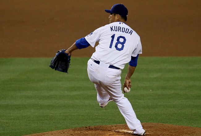 LOS ANGELES, CA - JULY 06:  Hiroki Kuroda #18 of the Los Angeles Dodgers throws a pitch against the New York Mets on July 6, 2011 at Dodger Stadium in Los Angeles, California.  (Photo by Stephen Dunn/Getty Images)