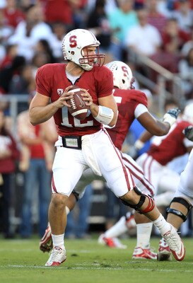 PALO ALTO, CA - OCTOBER 09:  Andrew Luck #12 of the Stanford Cardinal drops back to pass the ball against the USC Trojans at Stanford Stadium on October 9, 2010 in Palo Alto, California.  (Photo by Ezra Shaw/Getty Images)
