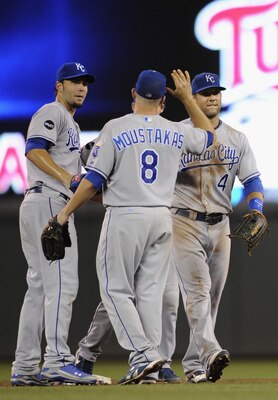 MINNEAPOLIS, MN - JULY 15: Eric Hosmer #35 (L), Mike Moustakas #8 and Alex Gordon #4 of the Kansas City Royals celebrate a win against the Minnesota Twins on July 15, 2011 at Target Field in Minneapolis, Minnesota. The Royals defeated the Twins 2-1. (Phot