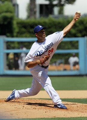 LOS ANGELES, CA - JULY 10:  Ted Lilly #29 of the Los Angeles Dodgers throws a pitch against the San Diego Padres on July 10, 2011 at Dodger  Stadium in Los Angeles, California.  (Photo by Stephen Dunn/Getty Images)