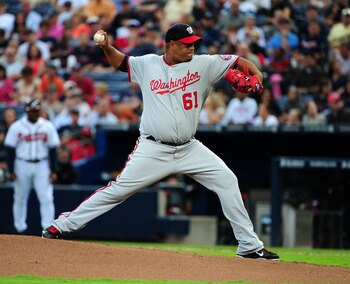 ATLANTA - JULY 15: Livan Hernandez #61 of the Washington Nationals pitches against the Atlanta Braves at Turner Field on July 15, 2011 in Atlanta, Georgia. (Photo by Scott Cunningham/Getty Images)