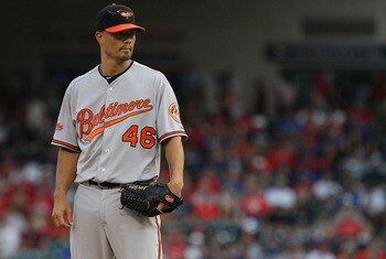 ARLINGTON, TX - JULY 06:  Jeremy Guthrie #46 of the Baltimore Orioles throws against the Texas Rangers at Rangers Ballpark in Arlington on July 6, 2011 in Arlington, Texas.  (Photo by Ronald Martinez/Getty Images)