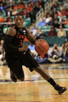GREENSBORO, NC - MARCH 10:  Malcolm Grant #3 of the Miami Hurricanes drives against the Virginia Cavaliers during the second half of the game in the first round of the 2011 ACC men's basketball tournament at the Greensboro Coliseum on March 10, 2011 in Gr
