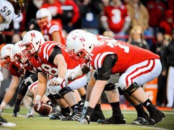 LINCOLN, NE - NOVEMBER 26: Mike Caputo #58 of the Nebraska Cornhuskers and the rest of the Nebraska offensive line powered their way past the Colorado Buffaloes during their game at Memorial Stadium on November 26, 2010 in Lincoln, Nebraska. Nebraska defe